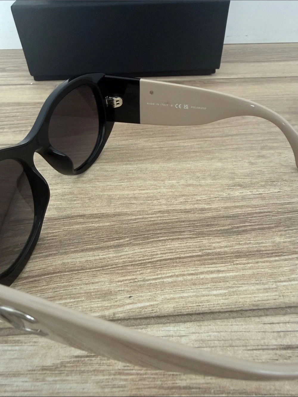 CHANEL Black Cat-Eye Sunglasses with Beige Temple Accents